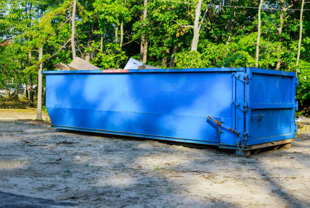 metal trash construction garbage dumpsters on metal container house renovation.